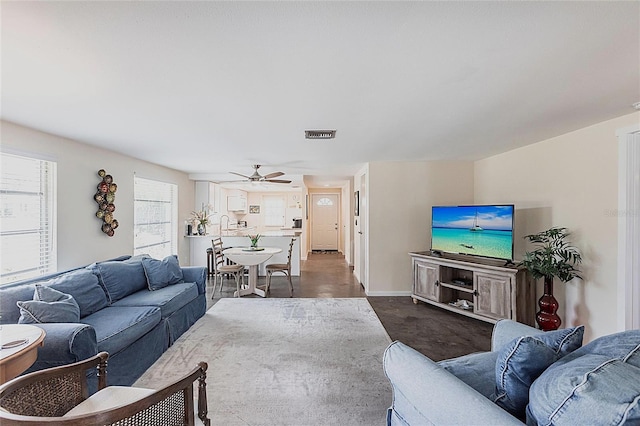 320 W Ann St, Punta Gorda, FL 33950 - living room with visible vents and a ceiling fan