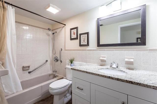 320 W Ann St, Punta Gorda, FL 33950 - bathroom with vanity, toilet, tile walls, and shower / bath combo