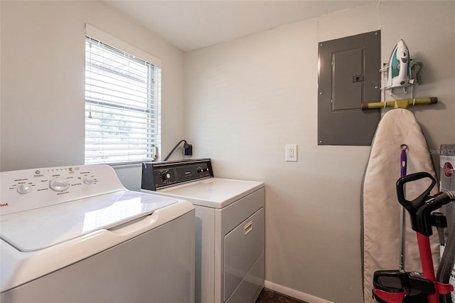 320 W Ann St, Punta Gorda, FL 33950 - laundry area featuring electric panel, laundry area, separate washer and dryer, and baseboards