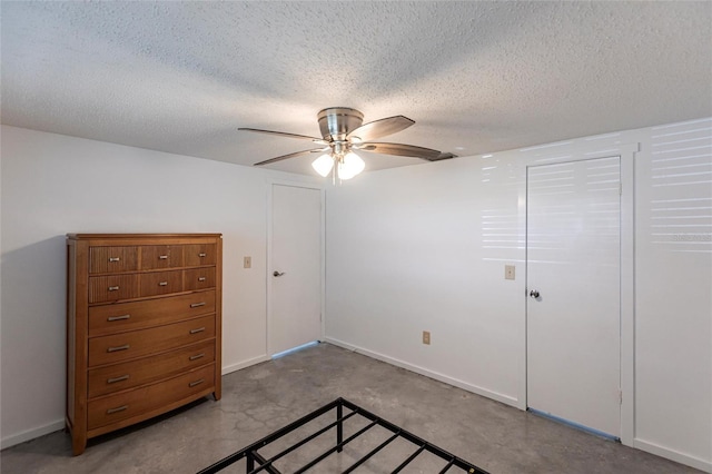 320 W Ann St, Punta Gorda, FL 33950 - unfurnished bedroom with ceiling fan and a textured ceiling