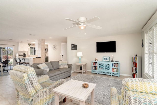 2331 Cannolot Blvd, Port Charlotte, FL 33948 - living room with light tile patterned floors, a ceiling fan, baseboards, and recessed lighting
