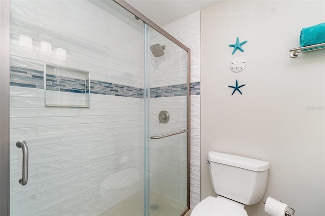 2331 Cannolot Blvd, Port Charlotte, FL 33948 - bathroom featuring a shower stall and toilet