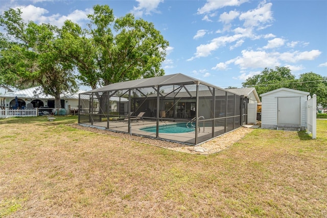 2331 Cannolot Blvd, Port Charlotte, FL 33948 - swimming pool featuring a storage shed, an outdoor structure, a yard, and a patio area