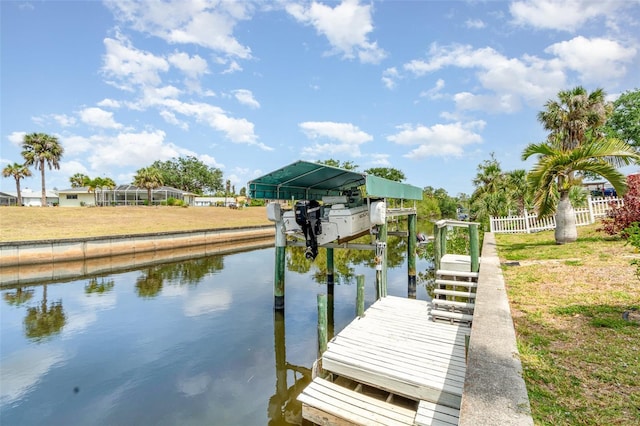 2331 Cannolot Blvd, Port Charlotte, FL 33948 - dock area featuring a water view, boat lift, and fence