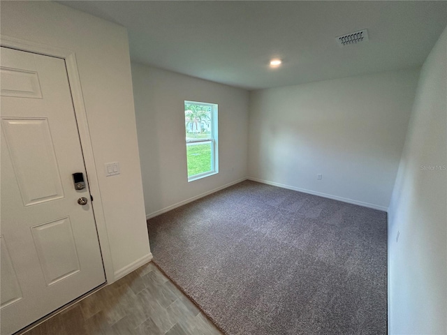70 Karas Trl, Palm Coast, FL 32164 - spare room featuring baseboards, recessed lighting, and visible vents