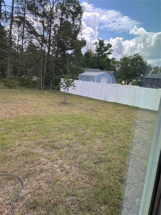 70 Karas Trl, Palm Coast, FL 32164 - view of yard featuring fence