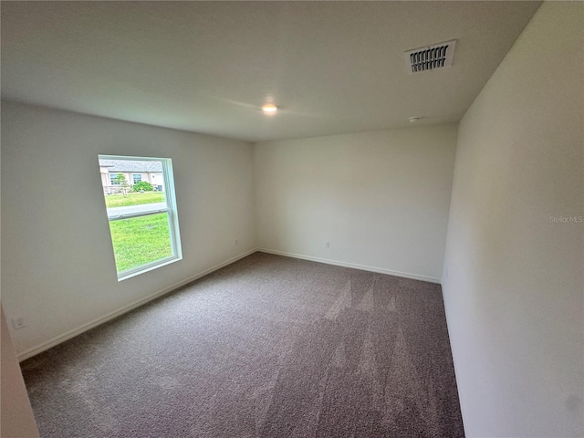 17 Luther Dr, Palm Coast, FL 32137 - carpeted empty room featuring baseboards