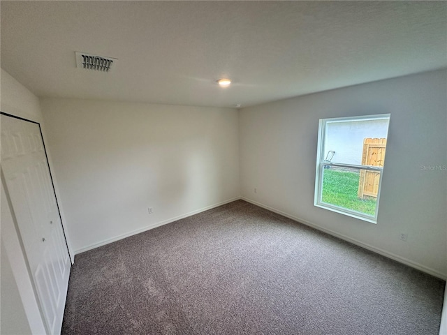 17 Luther Dr, Palm Coast, FL 32137 - carpeted spare room with baseboards