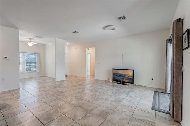 1443 SW 1st St, Cape Coral, FL 33991 - unfurnished living room featuring light tile patterned flooring and ceiling fan