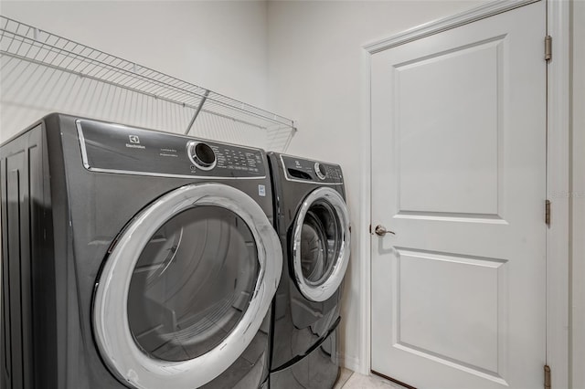 1443 SW 1st St, Cape Coral, FL 33991 - washroom featuring washer and dryer