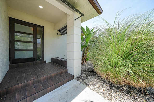 376 Portofino Dr, Punta Gorda, FL 33950 - entrance to property featuring stucco siding