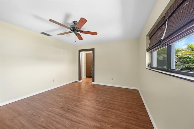 376 Portofino Dr, Punta Gorda, FL 33950 - spare room with baseboards, wood finished floors, and ceiling fan