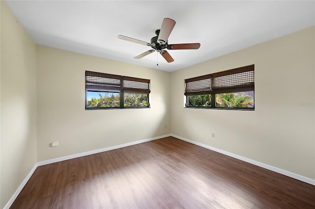 376 Portofino Dr, Punta Gorda, FL 33950 - empty room featuring wood finished floors, baseboards, and a ceiling fan