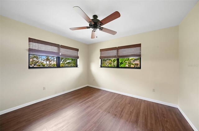 376 Portofino Dr, Punta Gorda, FL 33950 - spare room featuring wood finished floors, baseboards, and a ceiling fan