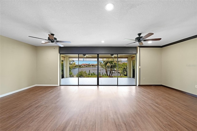 376 Portofino Dr, Punta Gorda, FL 33950 - unfurnished room featuring plenty of natural light, ceiling fan, baseboards, a textured ceiling, and recessed lighting