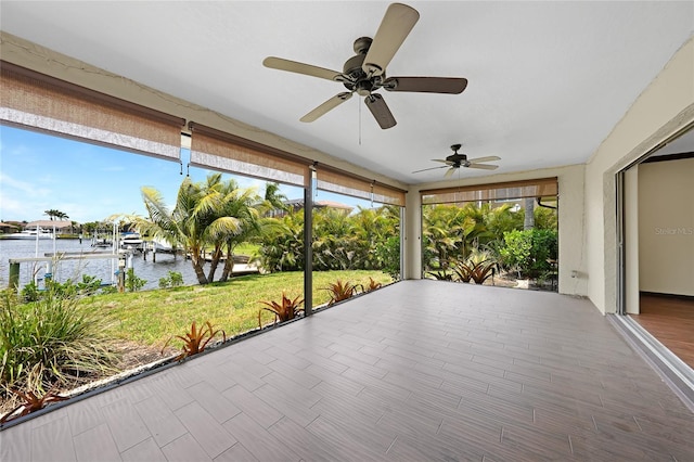 376 Portofino Dr, Punta Gorda, FL 33950 - unfurnished sunroom featuring a water view
