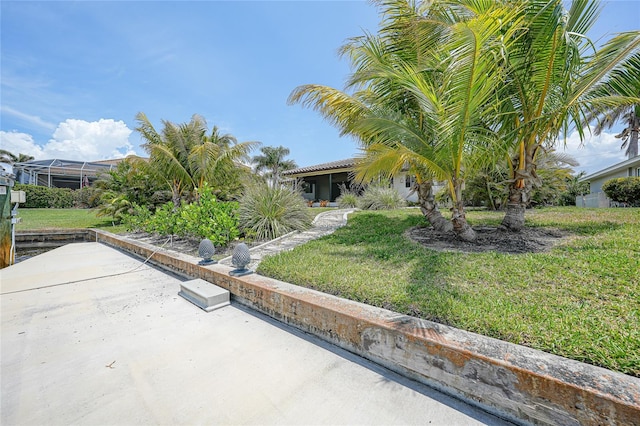 376 Portofino Dr, Punta Gorda, FL 33950 - obstructed view of property with a front yard and a patio area