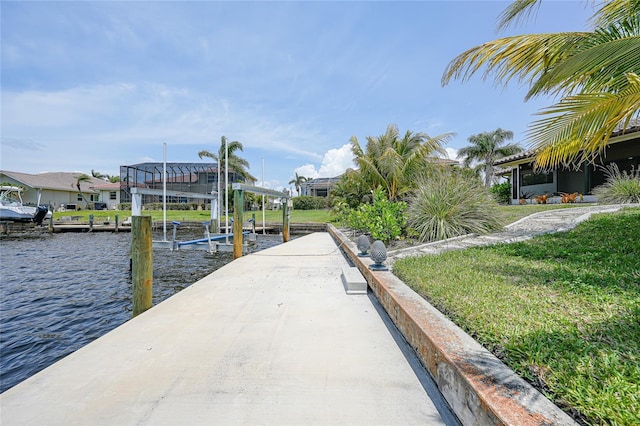 376 Portofino Dr, Punta Gorda, FL 33950 - dock area with boat lift, a water view, a yard, and a residential view