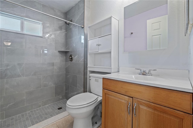 5527 Fairway Dr S, Punta Gorda, FL 33982 - bathroom featuring toilet, vanity, a tile shower, and tile patterned flooring