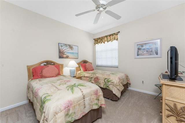 3412 Grand Vista Ct Unit 202, Port Charlotte, FL 33953 - bedroom with carpet flooring, baseboards, and ceiling fan