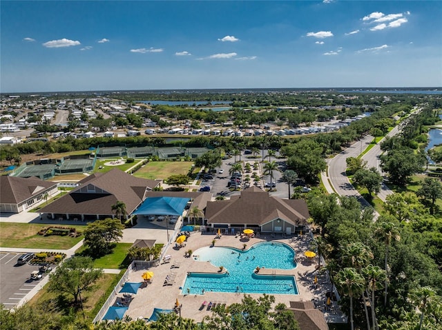 3412 Grand Vista Ct Unit 202, Port Charlotte, FL 33953 - aerial perspective of suburban area with a pool and a large body of water