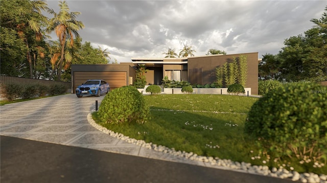 modern home featuring driveway, an attached garage, stucco siding, and a front lawn