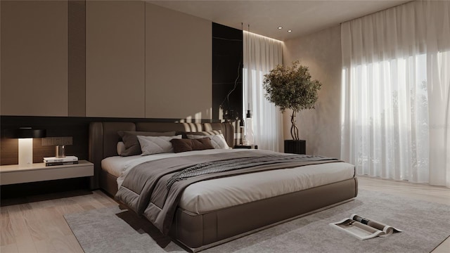 bedroom with light wood finished floors