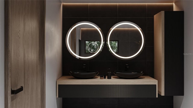bathroom featuring decorative backsplash and double vanity