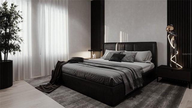 bedroom featuring wood finished floors