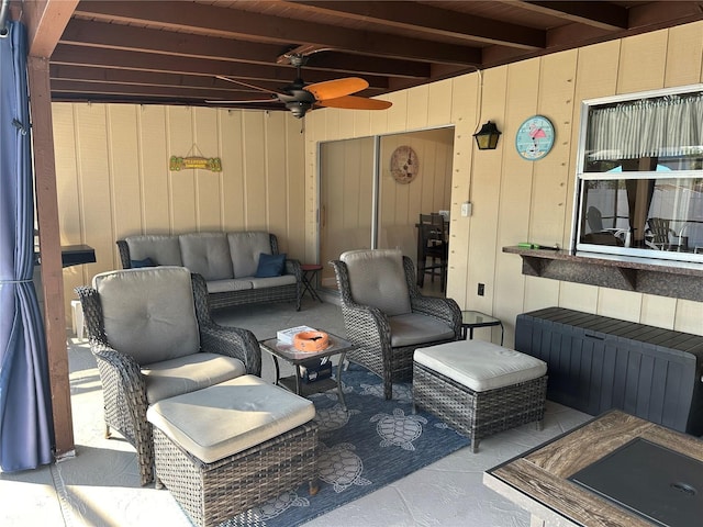 view of patio with ceiling fan and an outdoor hangout area