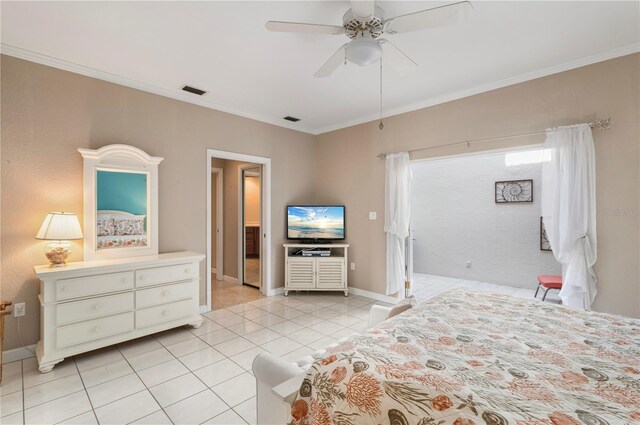 3800 Bal Harbor Blvd Unit 415, Punta Gorda, FL 33950 - bedroom featuring light tile patterned floors, crown molding, baseboards, and a ceiling fan