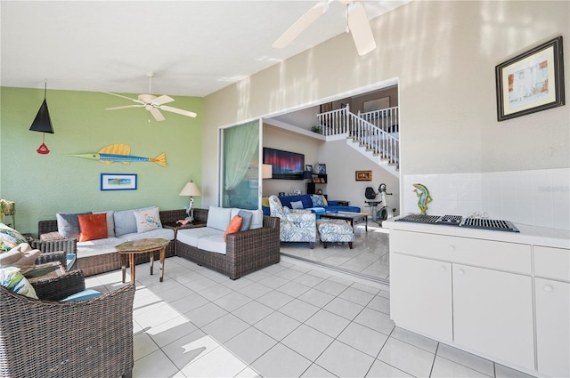 3800 Bal Harbor Blvd Unit 415, Punta Gorda, FL 33950 - living area with ceiling fan, light tile patterned floors, and stairs