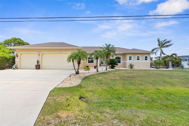 2911 Riverside Dr, Punta Gorda, FL 33950 - view of front facade with stucco siding, an attached garage, concrete driveway, and a front lawn