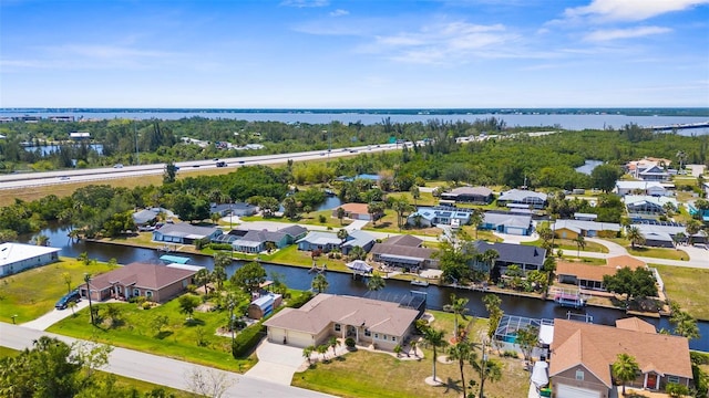 2911 Riverside Dr, Punta Gorda, FL 33950 - aerial perspective of suburban area with a nearby body of water