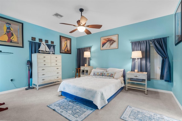2911 Riverside Dr, Punta Gorda, FL 33950 - carpeted bedroom featuring baseboards and ceiling fan