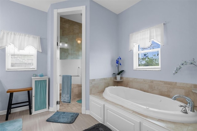 2911 Riverside Dr, Punta Gorda, FL 33950 - bathroom featuring a shower stall and a garden tub