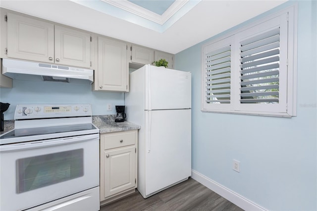 kitchen featuring under cabinet range hood, baseboards, white appliances, light countertops, and dark wood-style floors