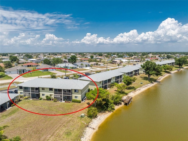 drone / aerial view featuring a water view