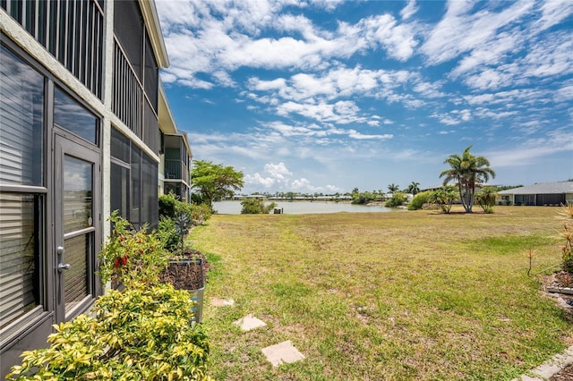 view of yard with a water view