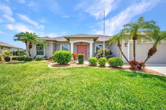 12951 SW Kingsway Cir, Lake Suzy, FL 34269 - view of front of home with stucco siding, an attached garage, a front lawn, and concrete driveway