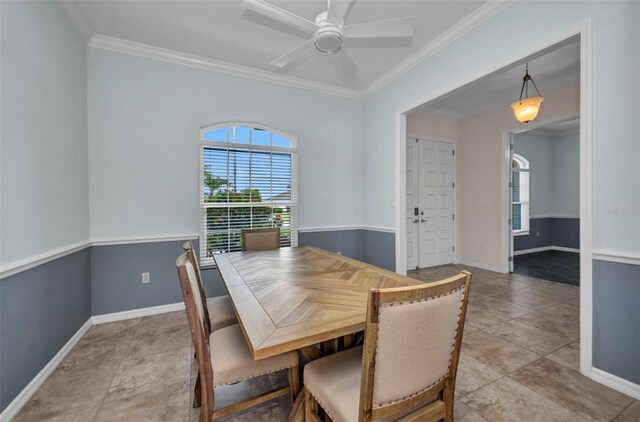 12951 SW Kingsway Cir, Lake Suzy, FL 34269 - dining area with ornamental molding, a ceiling fan, and baseboards