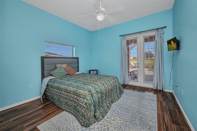 12951 SW Kingsway Cir, Lake Suzy, FL 34269 - bedroom with multiple windows, baseboards, access to outside, and wood finished floors