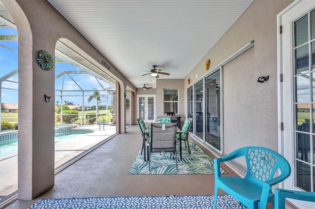 12951 SW Kingsway Cir, Lake Suzy, FL 34269 - sunroom / solarium with a ceiling fan and arched walkways