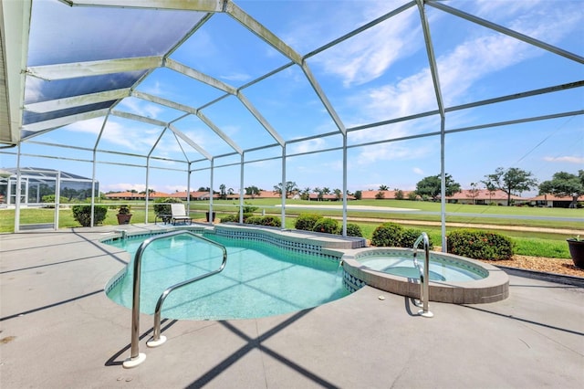 12951 SW Kingsway Cir, Lake Suzy, FL 34269 - view of swimming pool with a patio, a pool with connected hot tub, and glass enclosure