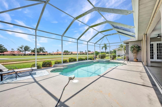 12951 SW Kingsway Cir, Lake Suzy, FL 34269 - view of pool with french doors, a patio area, a pool with connected hot tub, glass enclosure, and a ceiling fan
