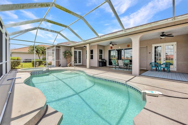 12951 SW Kingsway Cir, Lake Suzy, FL 34269 - view of swimming pool featuring french doors, ceiling fan, and a patio