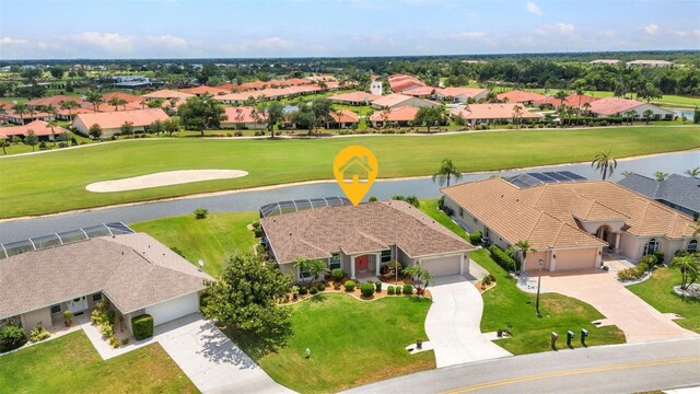 12951 SW Kingsway Cir, Lake Suzy, FL 34269 - aerial view of residential area with a large body of water and a golf course