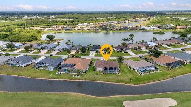 12951 SW Kingsway Cir, Lake Suzy, FL 34269 - aerial overview of property's location featuring nearby suburban area and a large body of water