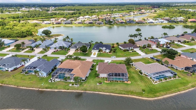 12951 SW Kingsway Cir, Lake Suzy, FL 34269 - aerial view of property and surrounding area with nearby suburban area and a large body of water