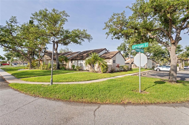 5301 Linksman Pl, North Port, FL 34287 - view of front of property featuring a front yard and a residential view